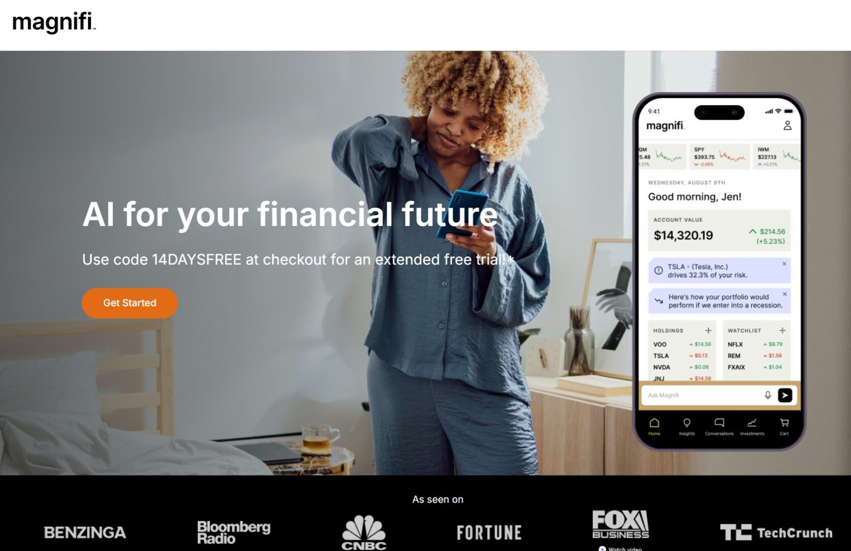 A person in pajamas looks at a phone amidst a promotional banner for a financial app called 'magnifi,' featuring a code for an extended free trial and media logos at the bottom.