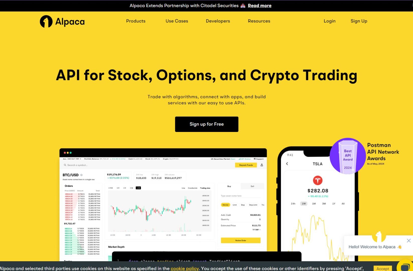 Screenshot of Alpaca's website showcasing API for stock, options, and crypto trading. The site features trading tools, graphs, and a sign-up button against a bright yellow background.